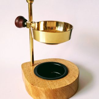 brass burner with wooden base